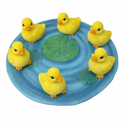 Cute baby duck on pond ornament