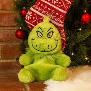 Dr. Seuss Aurora Palm Pals Grinch plush with a mischievous grin, 12cm tall.