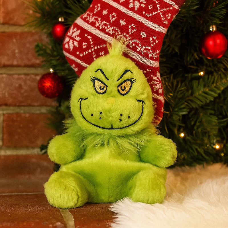 Dr. Seuss Aurora Palm Pals Grinch plush with a mischievous grin, 12cm tall.