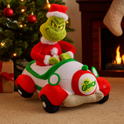 Grinch driving a colorful Seussian-style holiday car with bump-and-go action, wearing a Santa suit and mischievous grin.