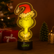 Dr. Seuss Neon Grinch Smile light featuring the iconic glowing Grinch smirk in bright neon-style design.