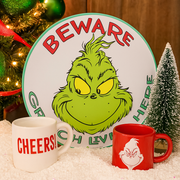 Dr. Seuss Round “Beware Grinch Lives Here” Sign 38cm with colorful Grinch design and festive holiday warning.