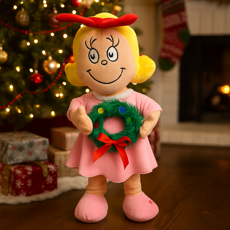 Dr. Seuss Cindy Lou Who figurine holding a green wreath, wearing a pink outfit and bow, animated to side-step with a sweet smile.