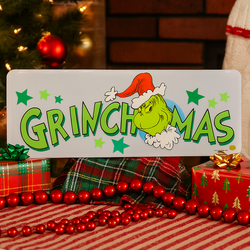 Dr. Seuss Grinchmas Acrylic Indoor Sign featuring the Grinch with "Merry Grinchmas" text, 80cm.
