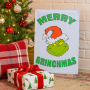 Dr. Seuss Grinch metal sign with “Merry Grinchmas” text, 35x24cm, festive wall décor in classic Grinch design.