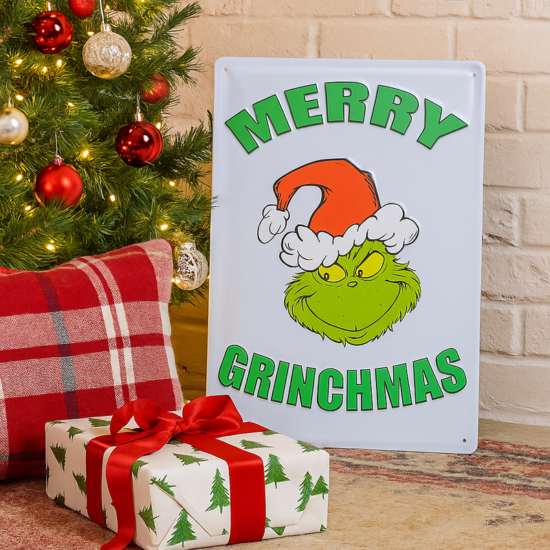 Dr. Seuss Grinch metal sign with “Merry Grinchmas” text, 35x24cm, festive wall décor in classic Grinch design.