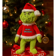 Merry Grinchmas Grinch plush toy wearing a red Santa outfit with "Merry Grinchmas" text, perfect for holiday decoration or gifting.