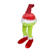 Grinch-themed Christmas stocking with green legs, and red boots.