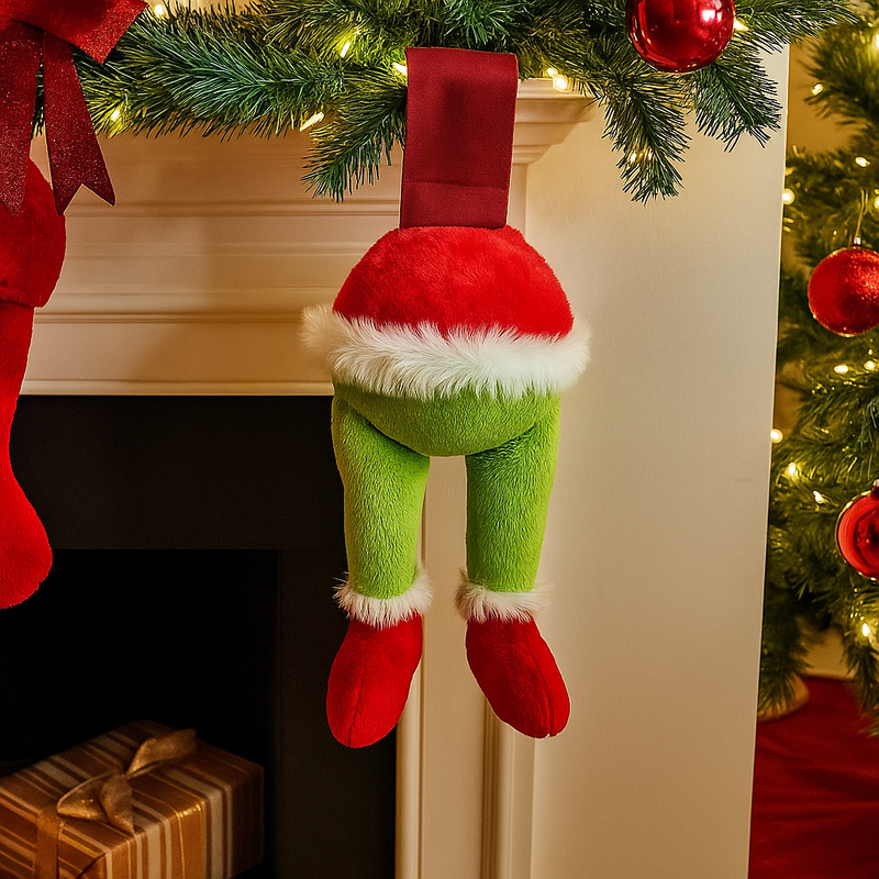Grinch-themed Christmas stocking with green legs, and red boots.