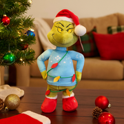 Small animated Grinch figure in blue sweater tangled in Christmas lights, side-stepping motion
