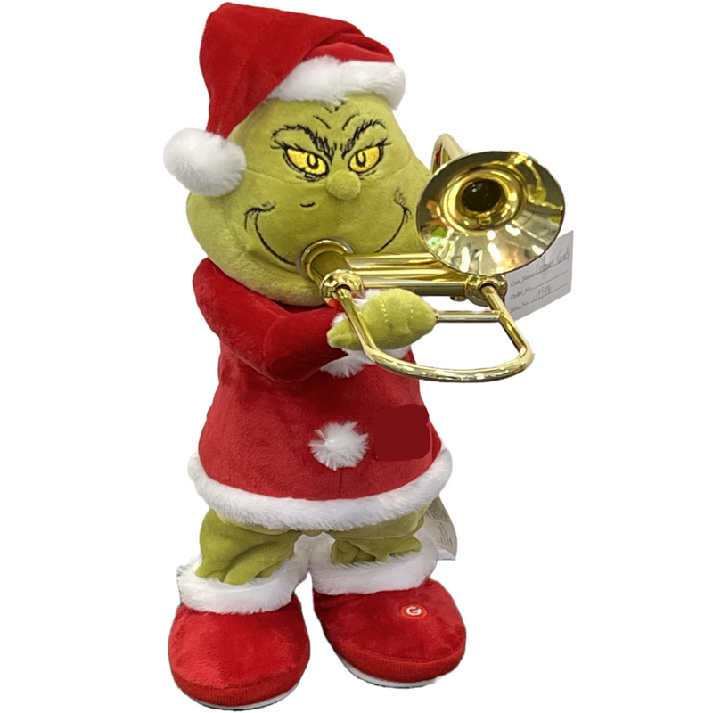 Plush Grinch figure standing and playing a trombone, wearing a Santa suit with animated features.