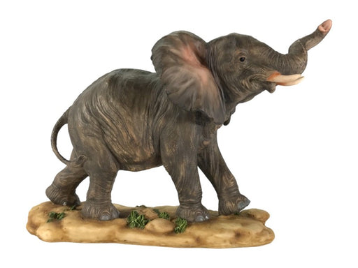Elephant figurine on textured base