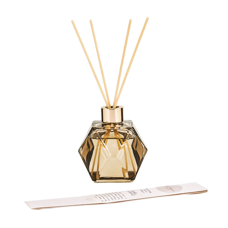 Brown bottle dispensing Vanilla Caramel fragrance