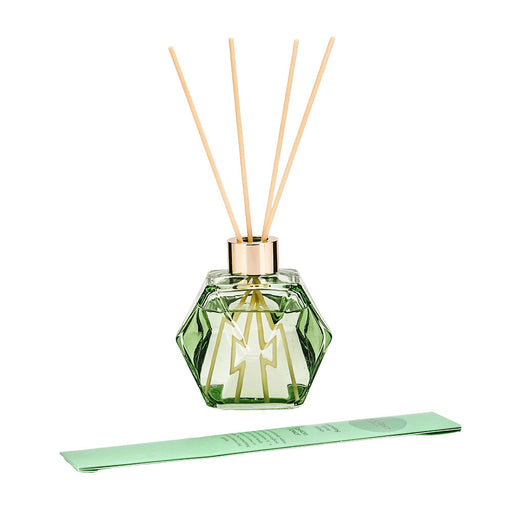 Green bottle dispensing Passion Flower fragrance