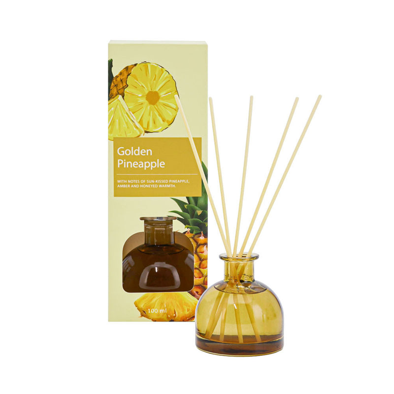 Small bottle dispensing Golden Pineapple fragrance