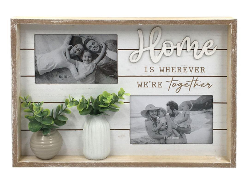 Photo frame with Home text and greenery