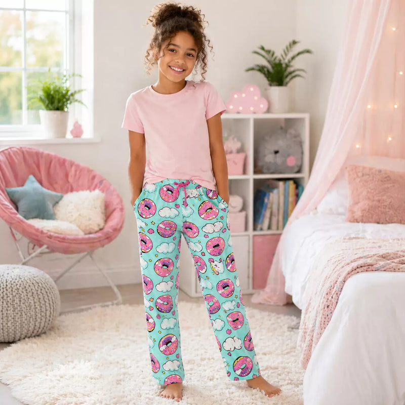 Girls PJ lounge pants with pockets in assorted designs, made for soft, cosy comfort during sleep and everyday lounging.