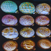 Pattern of colorful waffles on a dark background