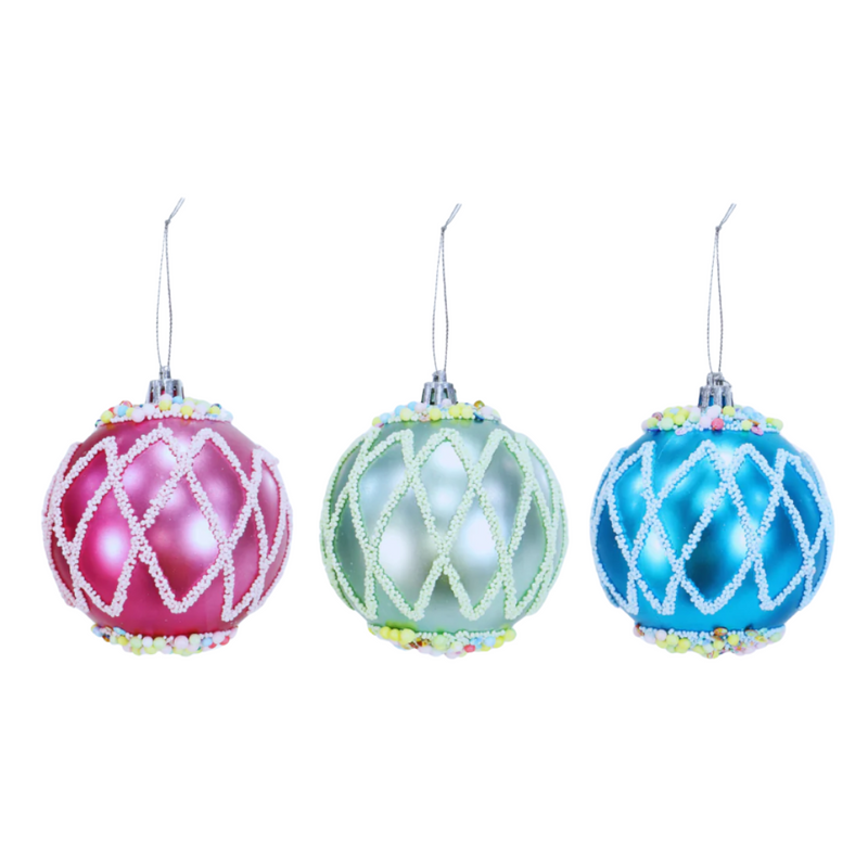 Three colorful Christmas ornaments with lattice designs on a white background