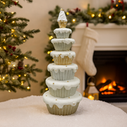 Gold Christmas tree decoration made of stacked cupcakes with glittery festive details – thumbnail
