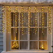 Warm white icicle lights with white waterfall 1092 LED