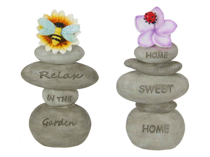 Rock with flower and inspirational word