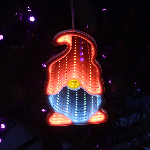 Infinity mirror Christmas gonk decoration glowing with LED lights hanging on a festive wall