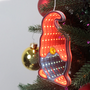 Infinity mirror Christmas gonk decoration glowing with LED lights hanging on a festive wall
