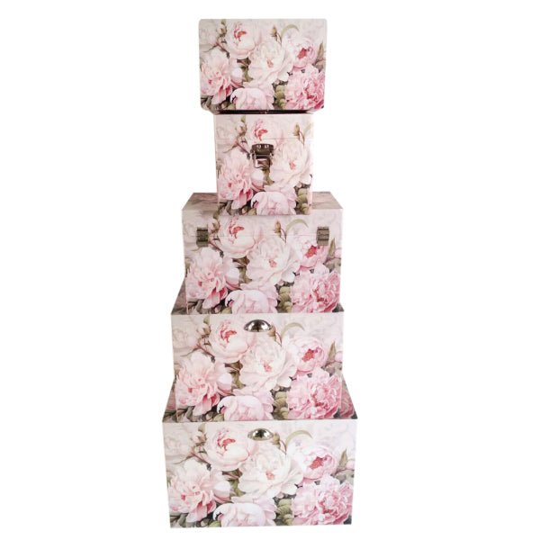 A set of five nesting storage trunks featuring a romantic pink Peony floral print.