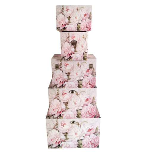 A set of five nesting storage trunks featuring a romantic pink Peony floral print.