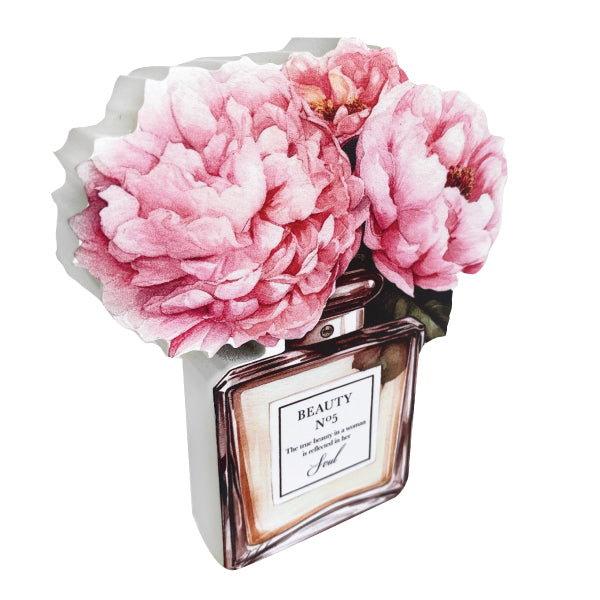 Freestanding table decor featuring a perfume bottle design and inspirational quotes.