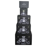 A set of five nesting storage trunks featuring chic Couture fashion designs. – thumbnail