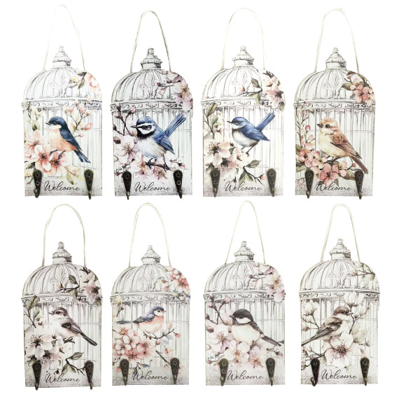 Wall-mounted key holder with a decorative bird cage silhouette and multiple hooks.