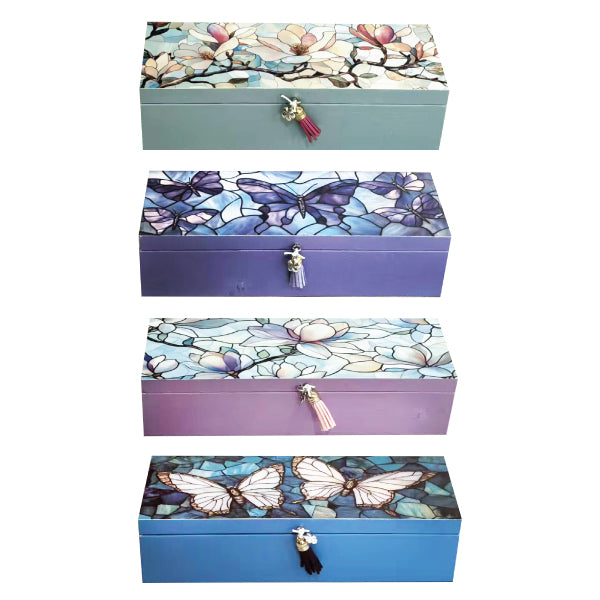 Three-compartment trinket box with a Magnolia stained glass design and tassel detail.