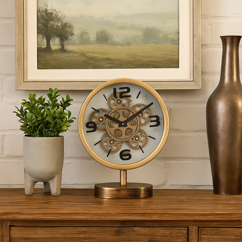 Gold tabletop clock with exposed gears and footed stem base, 41cm