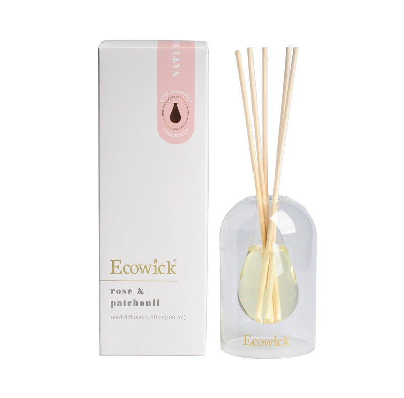 Clear lantern vessel dispensing Rose Patchouli fragrance