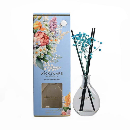 Vessel with dried botanicals dispensing Sea Salt Pomelo fragrance