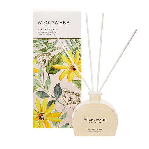Floral themed vessel dispensing Bergamot Fig fragrance
