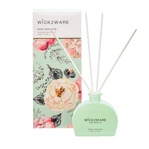 Floral themed vessel dispensing Rose Whisper fragrance