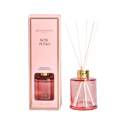Pink bottle dispensing Rose Petals fragrance