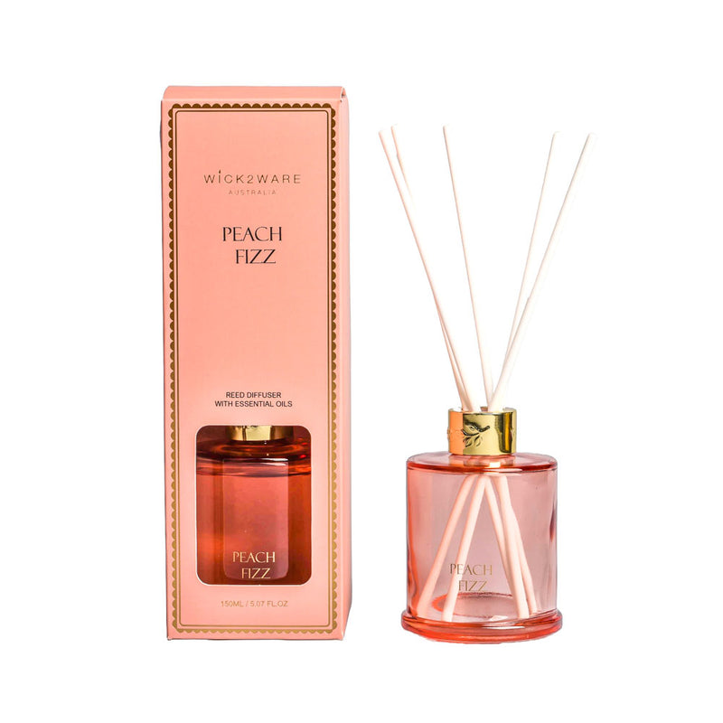 Peach colored bottle dispensing Peach Fizz fragrance