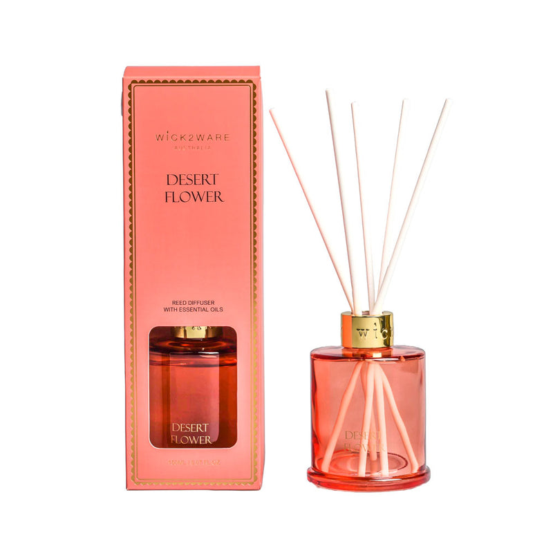 Orange bottle dispensing Desert Flower fragrance