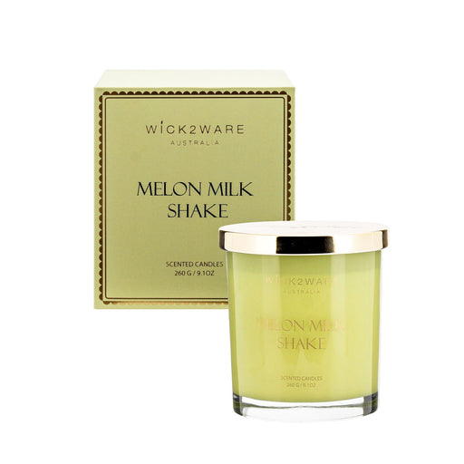 Boxed jar holding green Melon Milk Shake scented wax