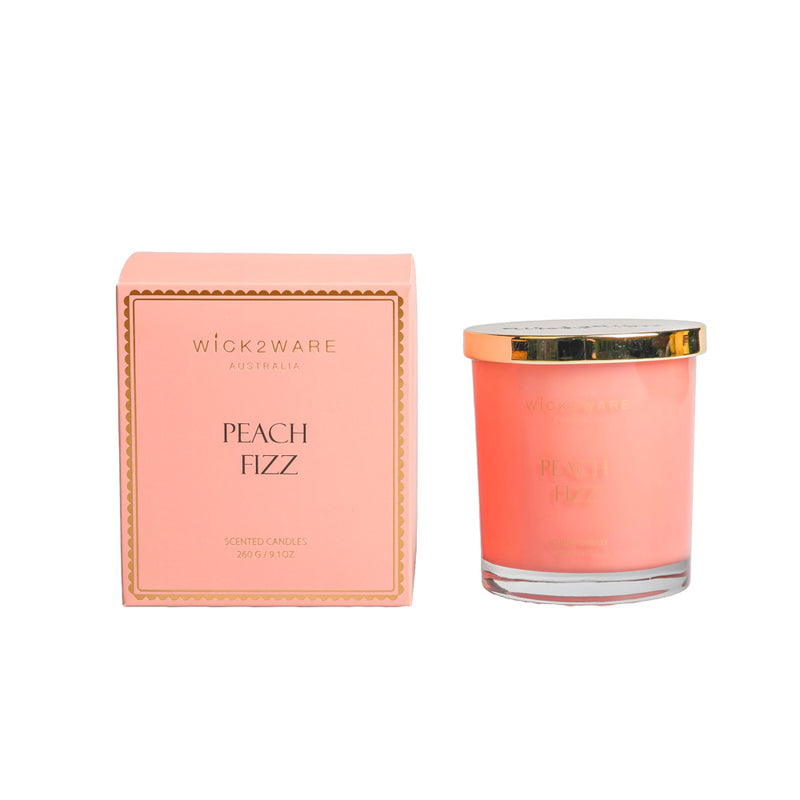 Boxed jar holding peach colored Peach Fizz scented wax