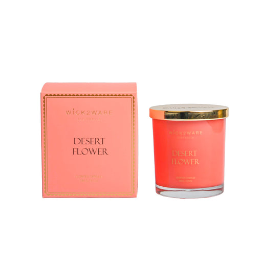Boxed jar holding orange Desert Flower scented wax