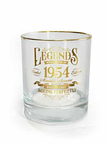 Clear tumbler with 1954 numerals and weighted base