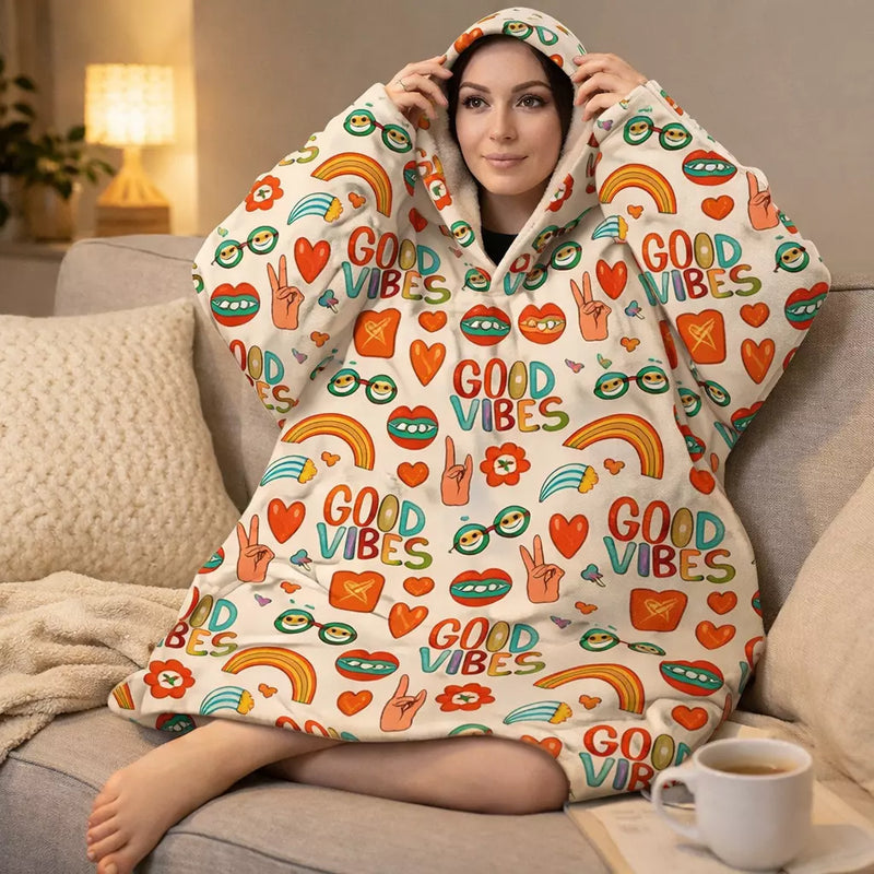 Ladies Snuggy Sherpa hoodie in assorted printed designs, featuring ultra-soft sherpa fleece for warm, cosy winter comfort at home.