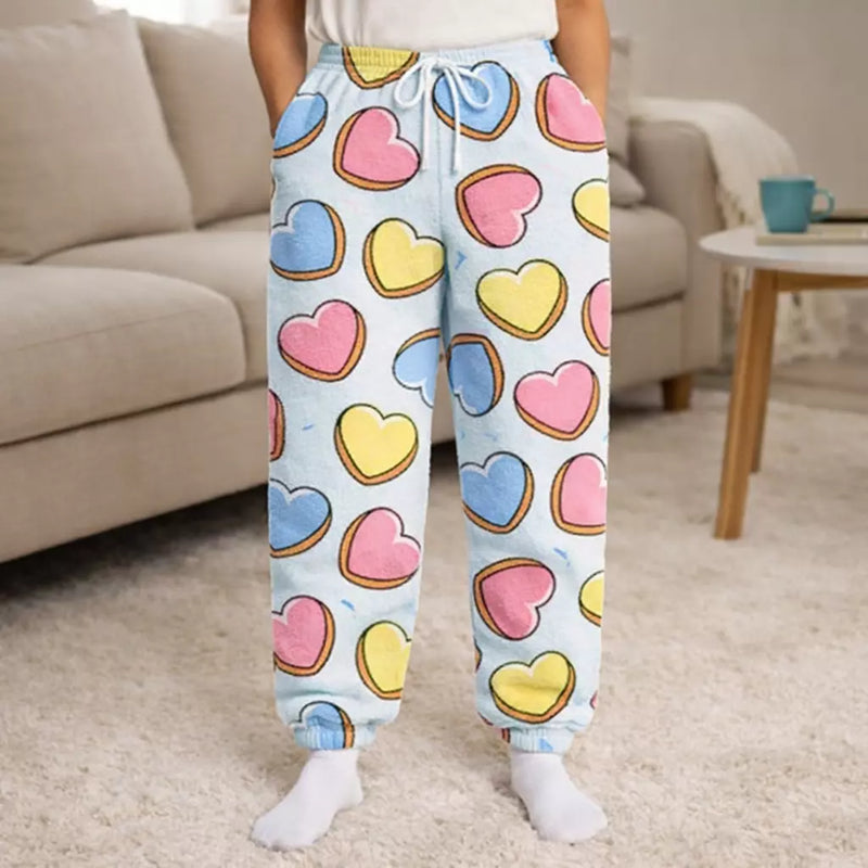 Ladies Snuggy Sherpa pants in assorted Style 2 designs, featuring ultra-soft fleece for warm, cosy comfort during colder days and nights.
