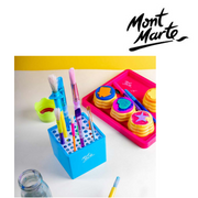 MM Paint Brush Stand holding assorted paint brushes on an art desk – thumbnail