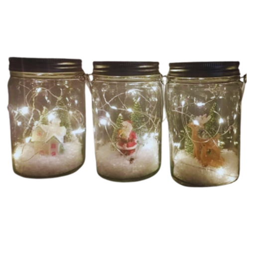 Mason Jar with snow effect, LED lights, and assorted festive characters for Christmas décor